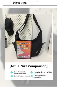 Detailed size comparison view of the black dumpling bag showing internal capacity
