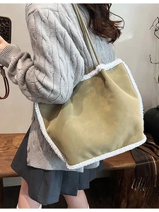 Olive green suede tote bag with faux fur trim and long knotted shoulder straps for women