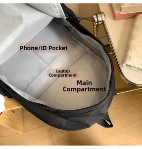 Internal view of nylon backpack with padded laptop sleeve and multi-function compartments