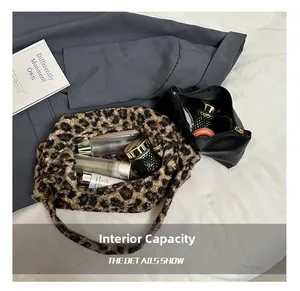 Detail view of large leopard faux fur tote bag with inner pouch and internal capacity