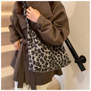 Detail of soft leopard print faux fur tote bag showing the plush texture and large capacity