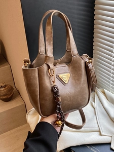 Retro brown bucket bag for women with dual top handles and adjustable strap