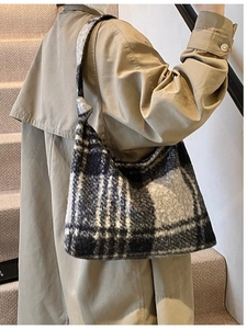 Fuzzy plaid hobo bag in black and white check with spacious design for winter styling
