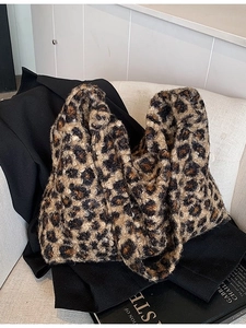 Faux fur leopard print tote bag with soft plush texture for winter fashion styles