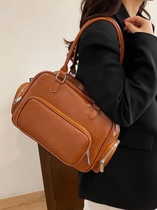 Brown vintage style large capacity shoulder bag for women with polished leather finish