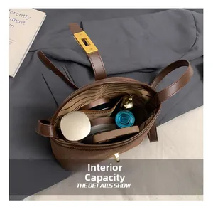 Interior view showing the spacious capacity of this brown crossbody bag with lining