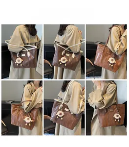 Collage of model wearing a vintage brown tote bag with sheep charm and textured PU leather