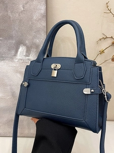 Navy blue pebble leather handbag with top handle and silver padlock for women