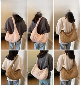 Close-up of quilted shoulder bags in pink and khaki showing soft textures and wide straps