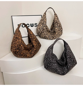 Detailed comparison of leopard print hobo bags in light brown, dark brown and cool grey