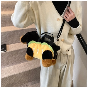 Detail of dachshund hot dog plush crossbody bag featuring textured faux fur and straps