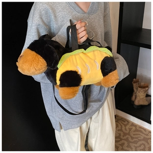 Close-up of plush dog crossbody bag with creative hot dog design and black strap