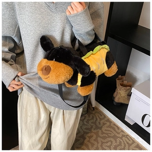 Detail of the plush dachshund dog shaped crossbody bag with a cute hotdog bun design