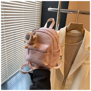 Roze mini rugzak van canvas met zijzakken en een schattige bruine pluche schaap hanger