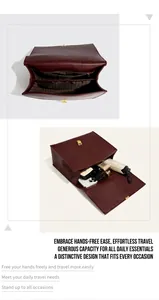 Detail showing deep red lychee leather bag interior with multiple compartments and lining
