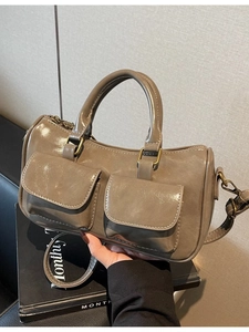 Vintage taupe faux leather bowling bag with front pockets and adjustable strap