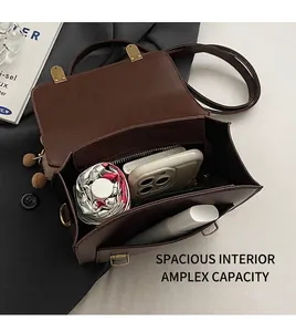 Internal view of dark brown vintage backpack showing spacious storage capacity and items