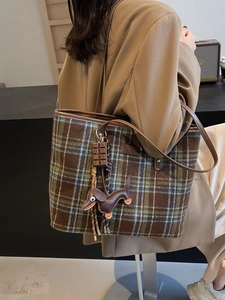 Brown and green plaid wool tote bag with dog charm and leather straps for autumn fashion