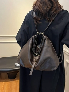 Vintage dunkelbraune große Leder-Tragetasche mit Ösenriemen für Damen im Alltag