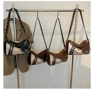 Detailed display of vintage color-blocked underarm bags in four distinct retro colors