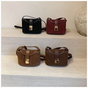 Detail view of retro matte square crossbody bags in black, burgundy, and brown shades
