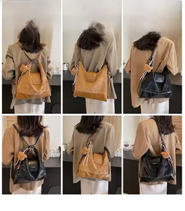 Detailed views of a versatile vintage leather tote bag shown in shoulder and backpack modes