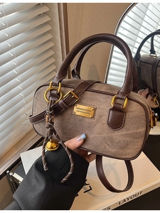 Retro brown washed canvas crossbody bag with top handle and gold hardware detail