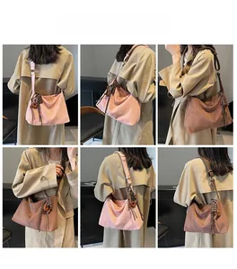 Fashionable large capacity crossbody tote bag styled with casual trench coat