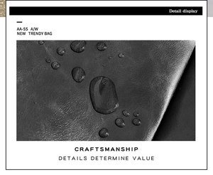 Detail showing the waterproof high-density leather texture with water droplets on black bag