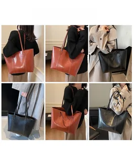 Detailed multi-angle views of large tote bag in black and brown leather on a model