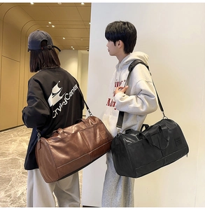 Retro faux leather travel bags in black and brown shown in a modern lifestyle setting