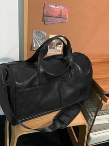 Retro black PU leather travel bag with large capacity and adjustable shoulder strap
