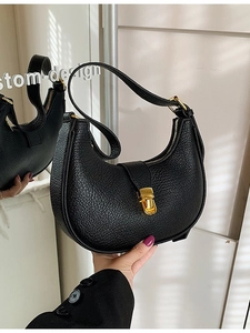 Retro black lychee leather half-moon shoulder bag with premium gold buckle and strap