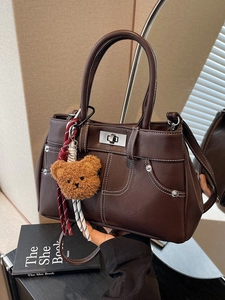 Women Retro PU Leather Handbag Contrast Stitching Bucket Bag With Teddy Bear Charm Metal Swivel Lock Commuter Crossbody Shoulder Bag