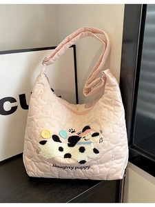 Pink quilted nylon tote bag with embroidered puppy and adjustable shoulder strap