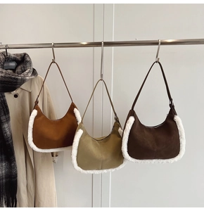 Three suede hobo bags with white faux fur trim in brown, green, and coffee colors