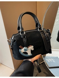 Retro black Boston handbag in matte finish with horse charm and adjustable strap