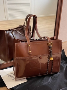 Caramel retro faux leather tote bag with transparent PVC panel and gold stud accents