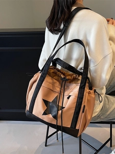 Grande borsa tote color albicocca con coulisse e stella nera per il tempo libero