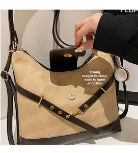 Detail view of the vintage tote bag showing strong magnetic closure for easy access