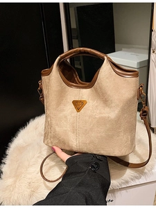 Grand sac cabas beige tissé avec garniture en cuir marron et bandoulière pour femme