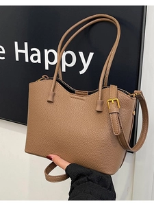 Sac fourre-tout marron en cuir avec bord ondulé et détails dorés pour femmes