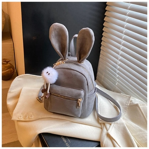 Mini sac à dos en faux daim gris avec oreilles de lapin et breloque monstre en peluche