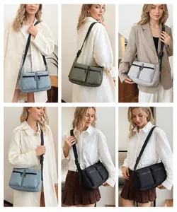 Detailed view of functional nylon crossbody bags with multiple pockets in four colors