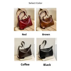 Selection of large hobo bags in dark red, caramel brown, coffee, and black leather colors