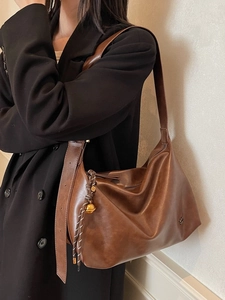 Brown leather large hobo tote bag for women with golden planet pendant charm
