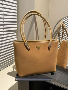Classic brown suede tote bag with large capacity and elegant gold metal triangle detail