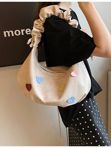 Beige tote bag with colorful heart patches and ruffled cloud shoulder strap for women