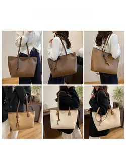 Diverse visuali della borsa tote grande in colori marrone, kaki e beige da donna