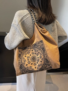 Retro khaki drawstring tote bag with paisley pattern and woven shoulder straps